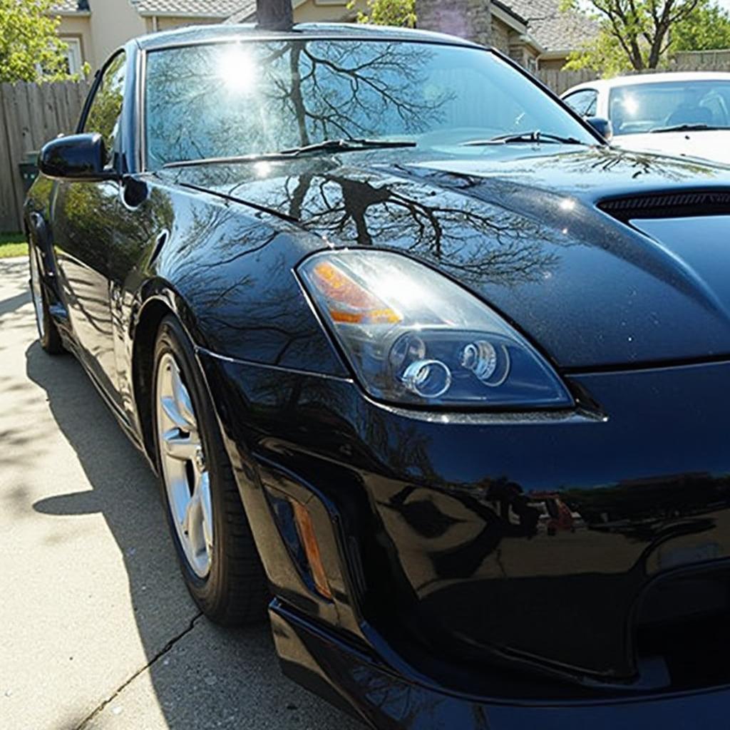 A gleaming black car with a showroom shine.