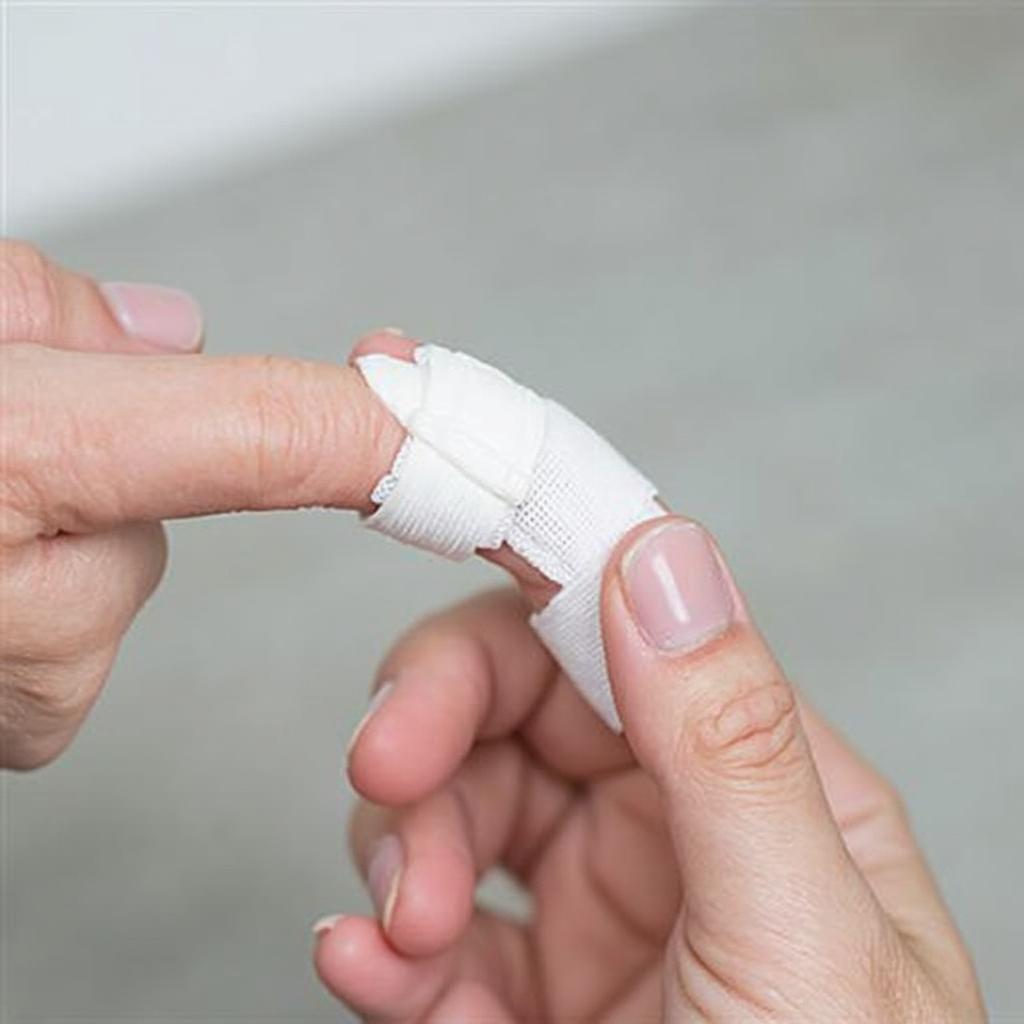 Fingertip splint applied to a broken finger