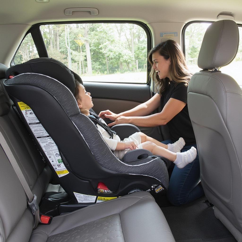 Rear-facing car seat installation demonstration