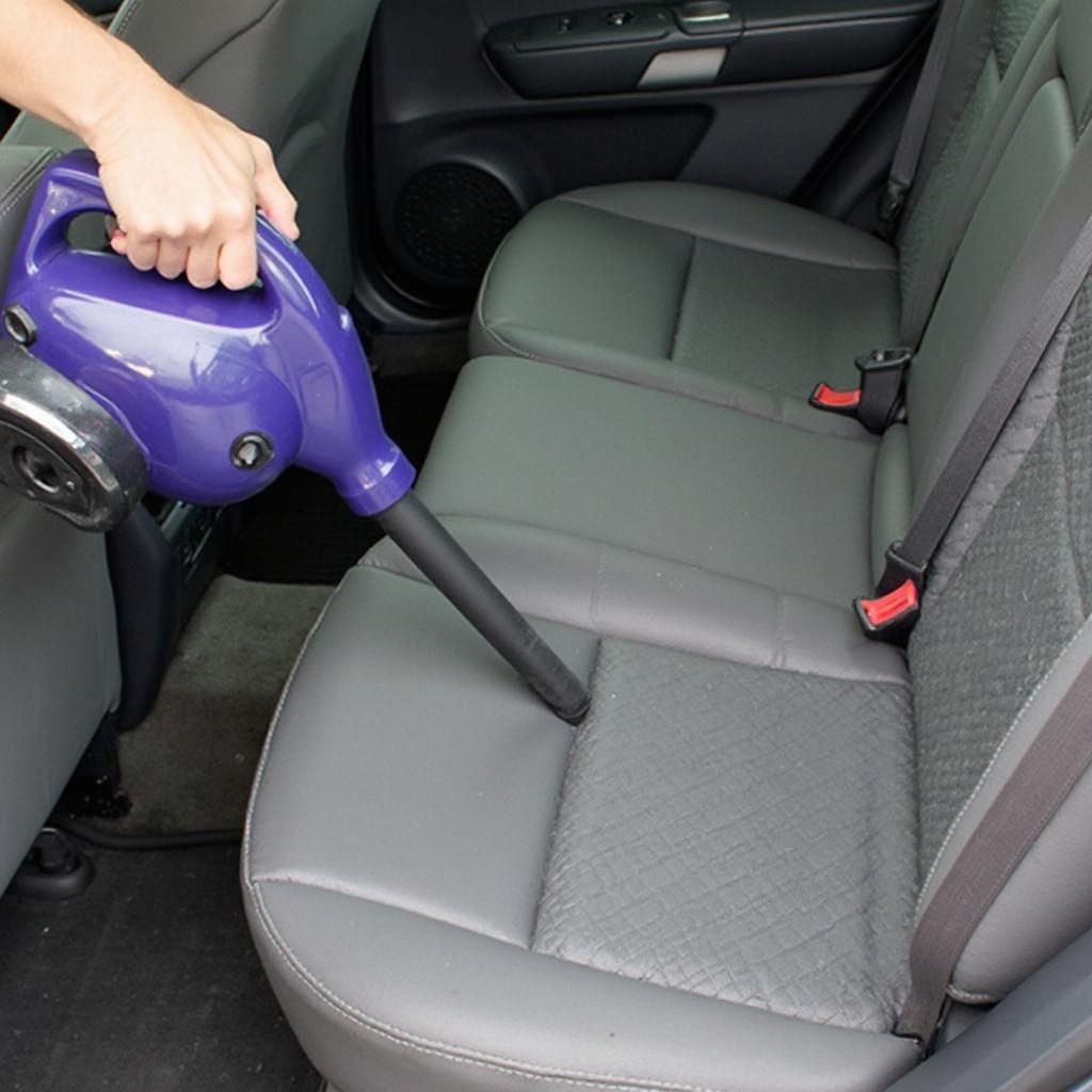 Thoroughly Vacuuming Car Interior