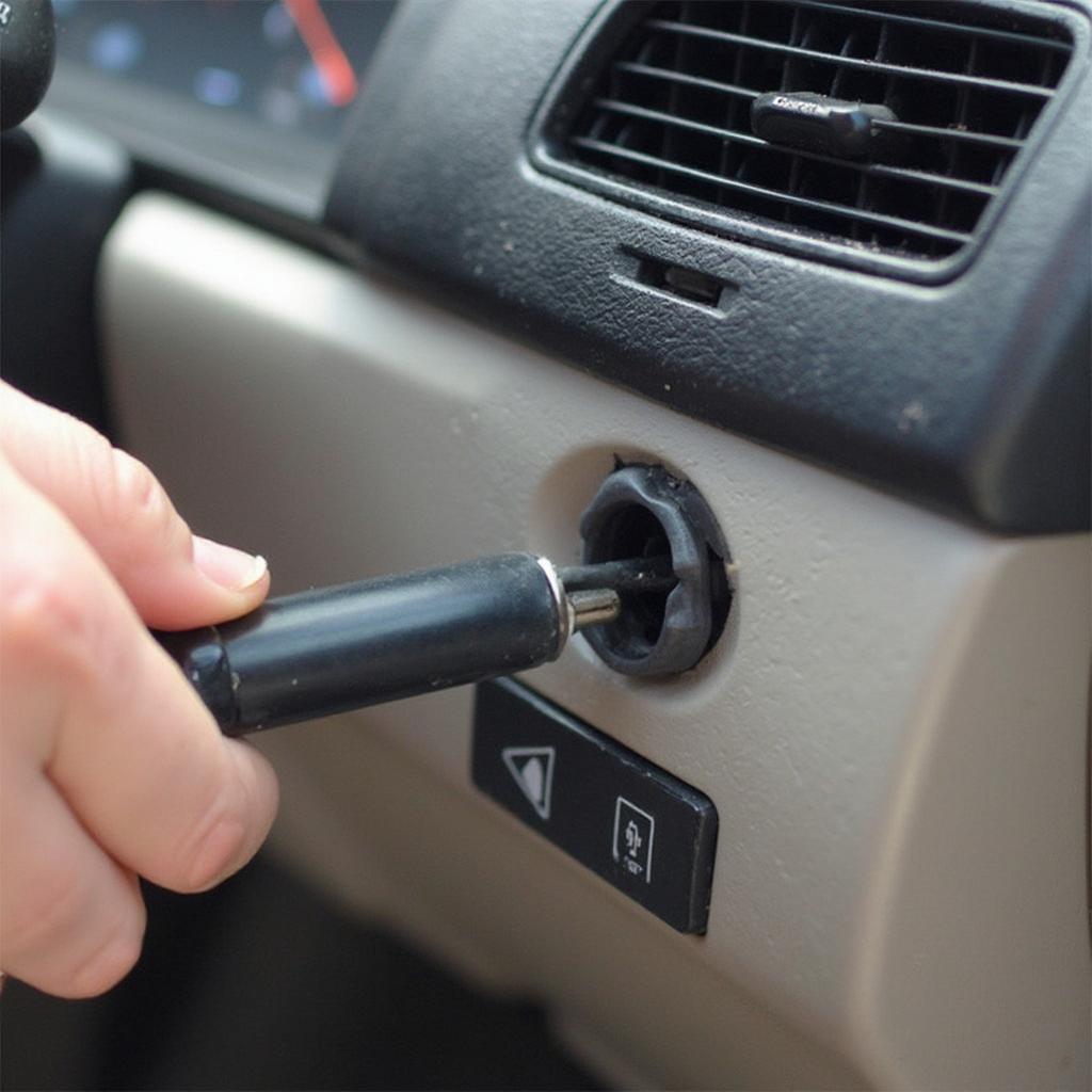 Removing a Stuck Car Charger Tip with Pliers