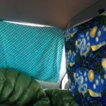 Homemade curtains for privacy in a car.